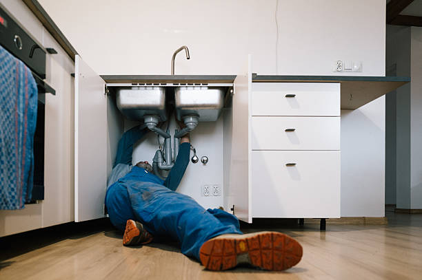 Professional Plumbing technician working in Taftville, CT